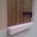 -Vierteaguas / Solarete con cabeza